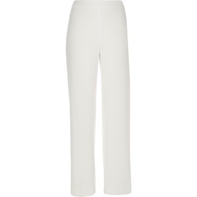 White high waisted wide leg trousers